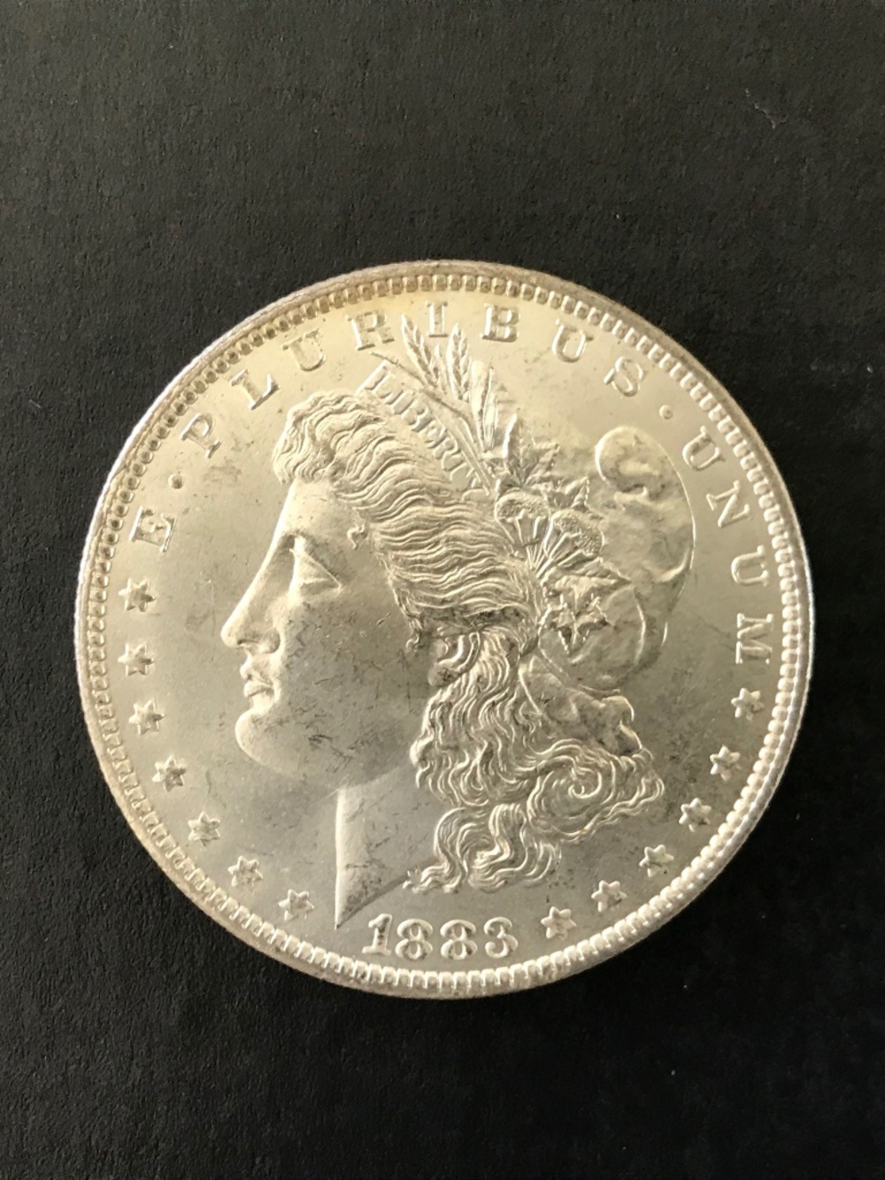 1883 O Morgan Silver Dollar, 90% Silver, New Orleans Mint, Unc, ? Low to Mid MS